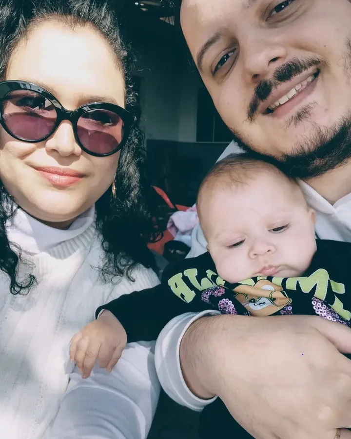 Breno and his wife with their baby niece